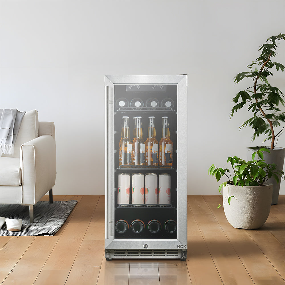 A 3.2 Cu Ft Compact Beverage Outdoor Refrigerator 96 cans is positioned in an outdoor setting between flowerpots and a sofa