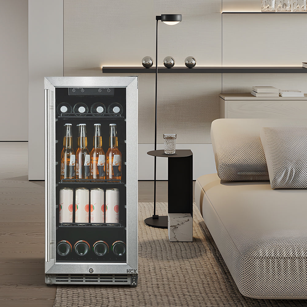 A 3.2 Cu Ft Compact Beverage Outdoor Refrigerator 96 cans is placed in the living room setting beside a sofa